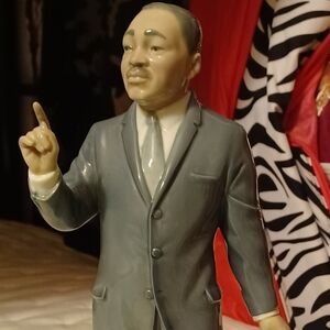 Elegant Gray Figurine on Ornate Base